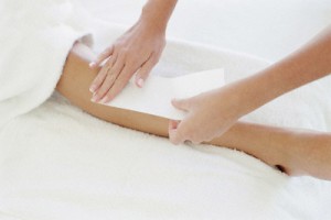 Woman Having Her Legs Waxed